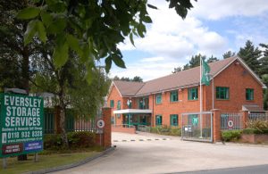 View of the entrance to Eversley Storage from the A327 with the office building behind.